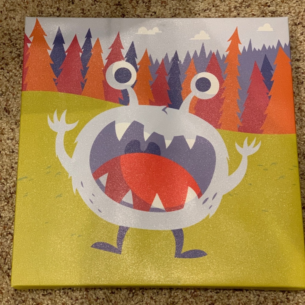 3 canvas monster-theme wall art